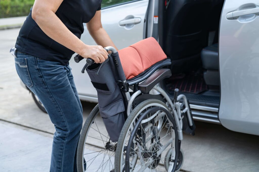 asian woman folding | Assist Travel Transport