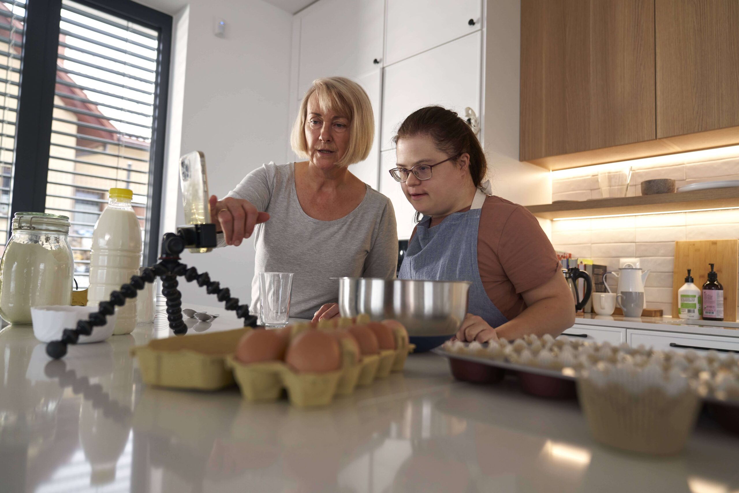 down syndrome woman and her mother teaching Development Life Skills