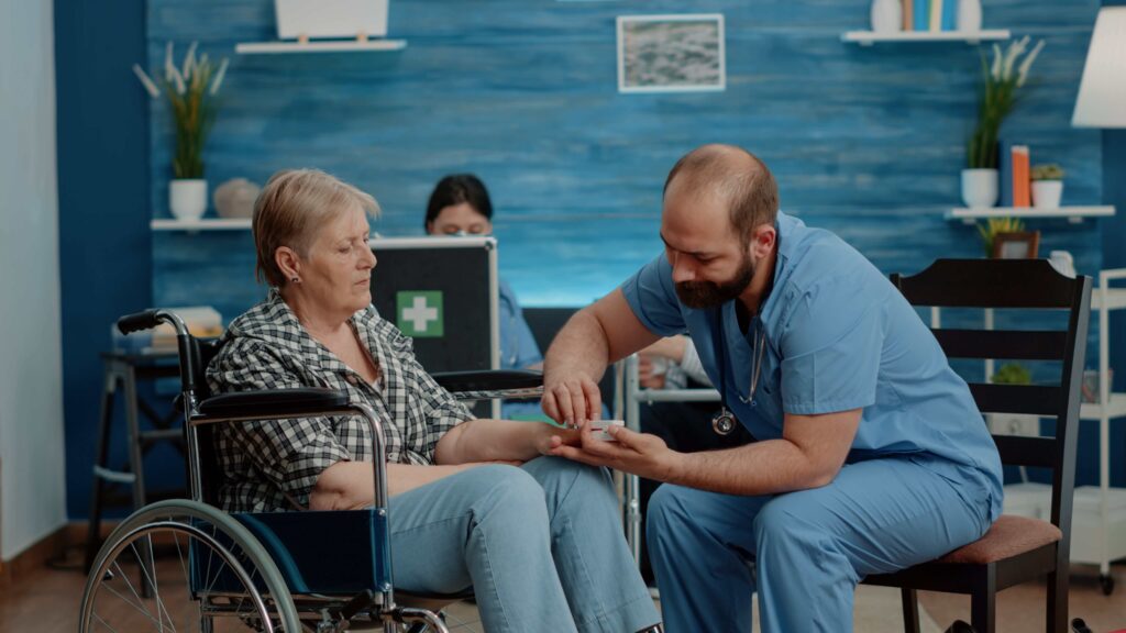 man nurse putting oximeter with Community Nursing Care with Therapeutic Support and community access | Community Nursing Care