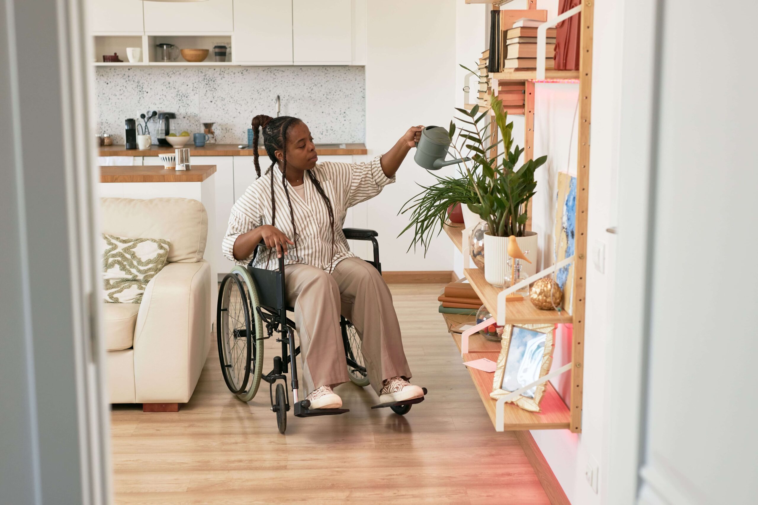 watering-plants-in-modern - Accommodation Tenancy and helping daily tasks shared living