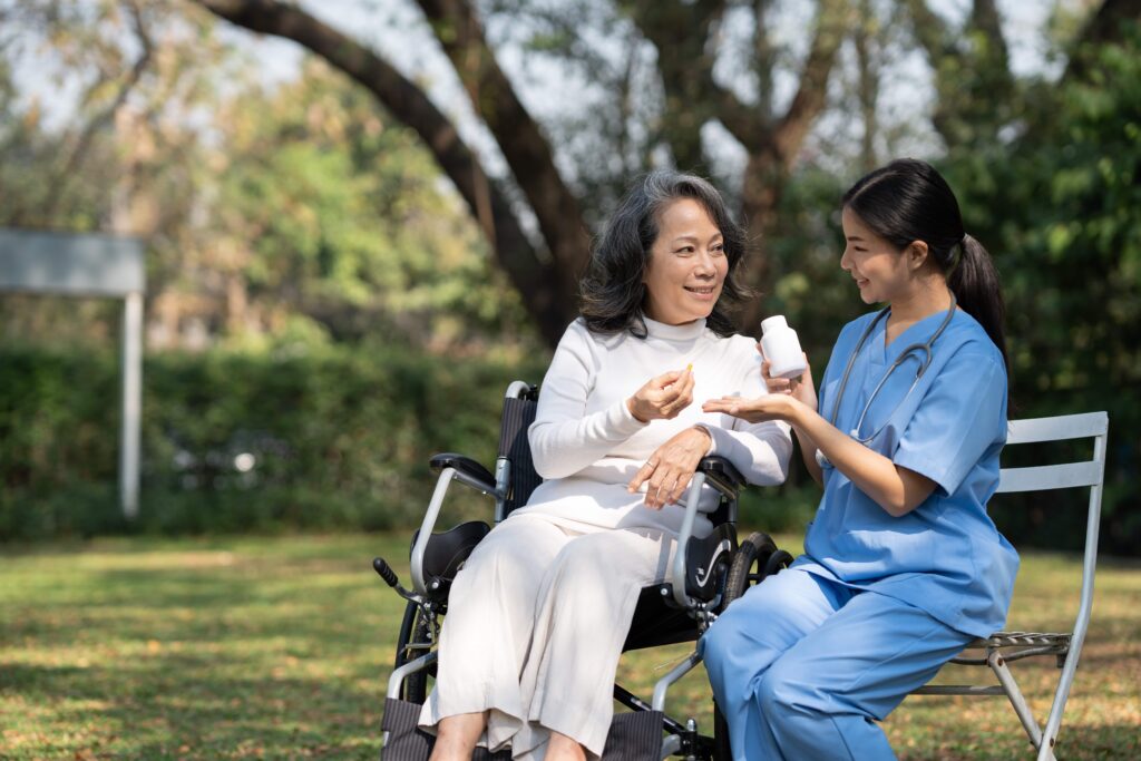 young asian nurse giving a Community Nursing Care